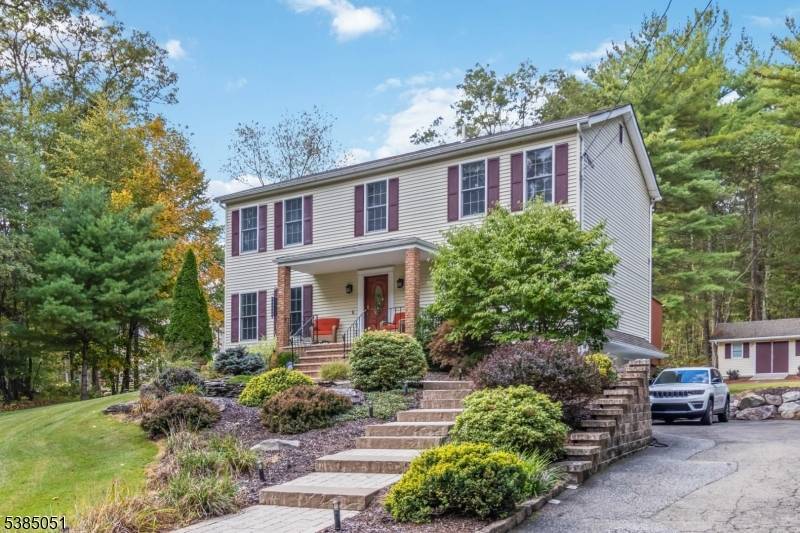 Welcome to this impeccably maintained and truly move in ready Center Hall Colonial, where timeless design and modern comforts create an exceptional lifestyle.