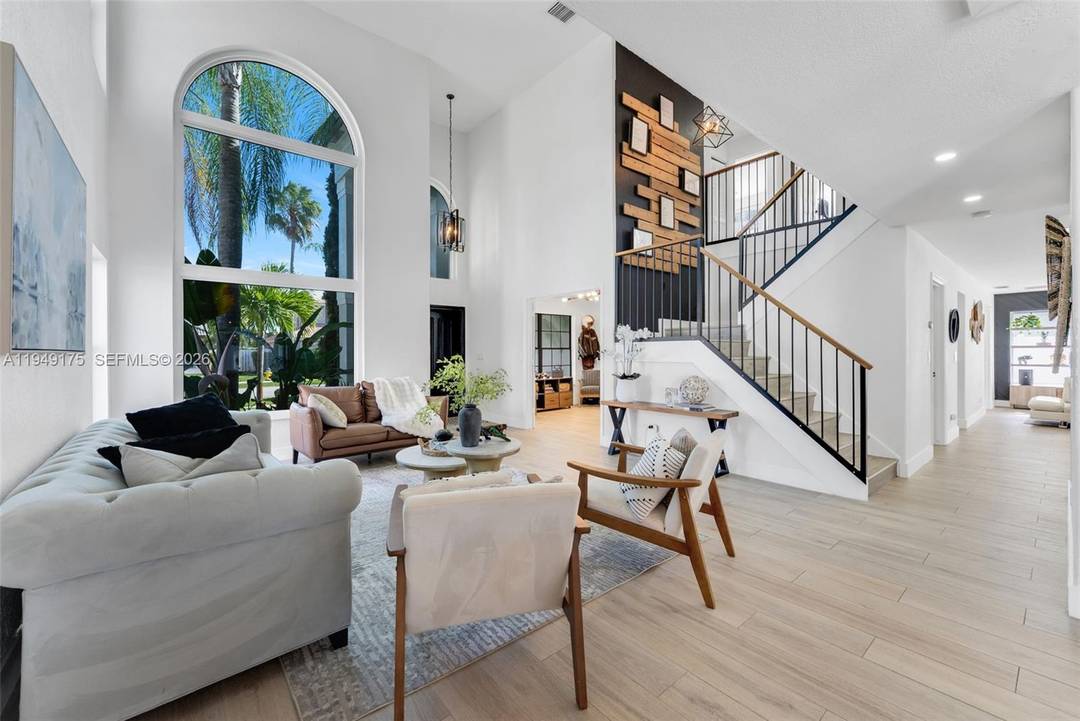 Beautifully remodeled 5 bedroom, 3 bath home in a gated community, featuring thoughtful design throughout.