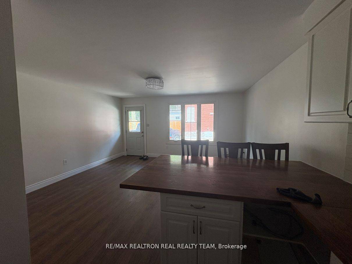 Bright And Spacious Large Open Concept 2 Bedrooms 1 Washrooms Unit On Main Floor, The basement offers additional space that can be used for storage.