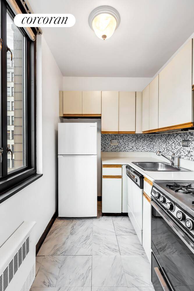 Feel right at home in this bright and spacious studio apartment at the luxurious full service cooperative, The Ascot, located in prime NoMad !