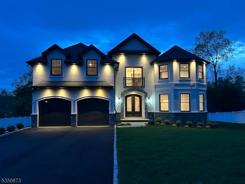Discover timeless elegance in this brand new custom built home in desirable Packanack Lake, featuring 5 spacious bedrooms and 4.