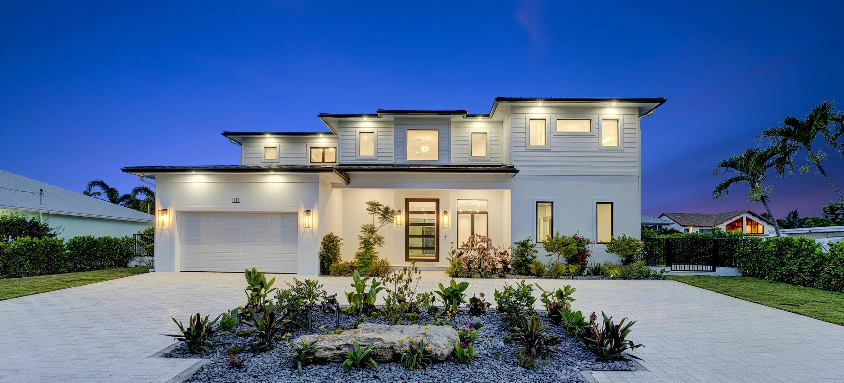 Welcome to 101 feet of direct waterfront on a private road in unincorporated Delray Beach's coveted 33483.