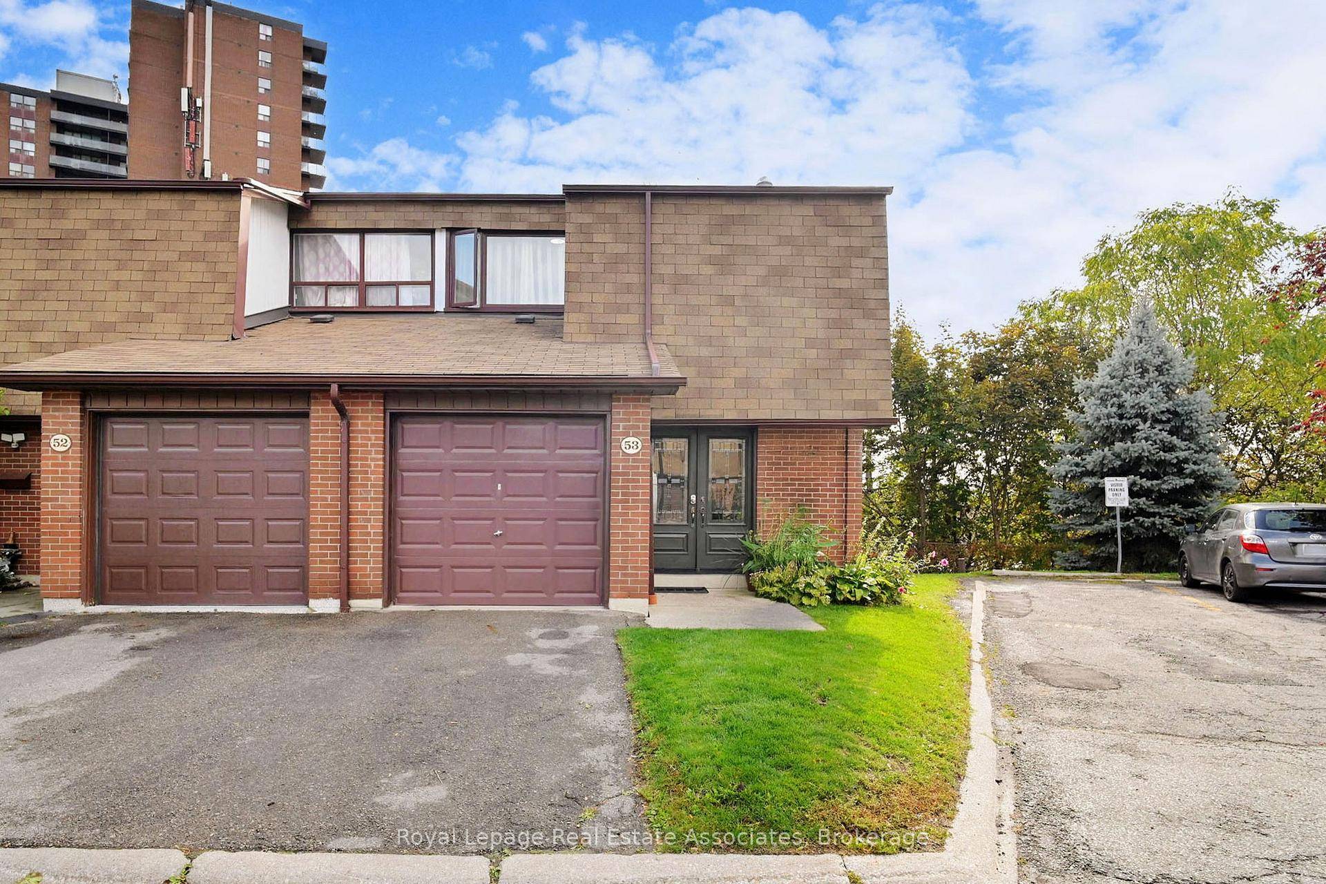 This Tastefully Renovated Corner Townhouse That Feels Like A Semi Is Completely Turn Key !
