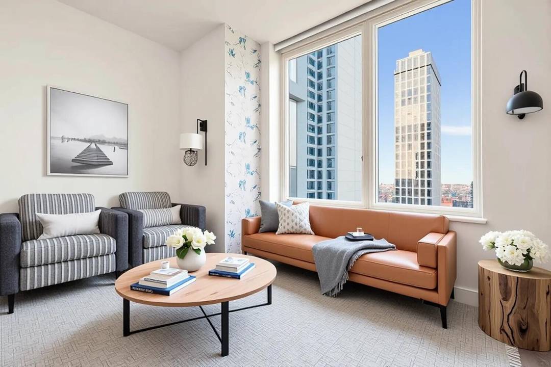 This spacious high floor alcove studio offers striking views and abundant light.