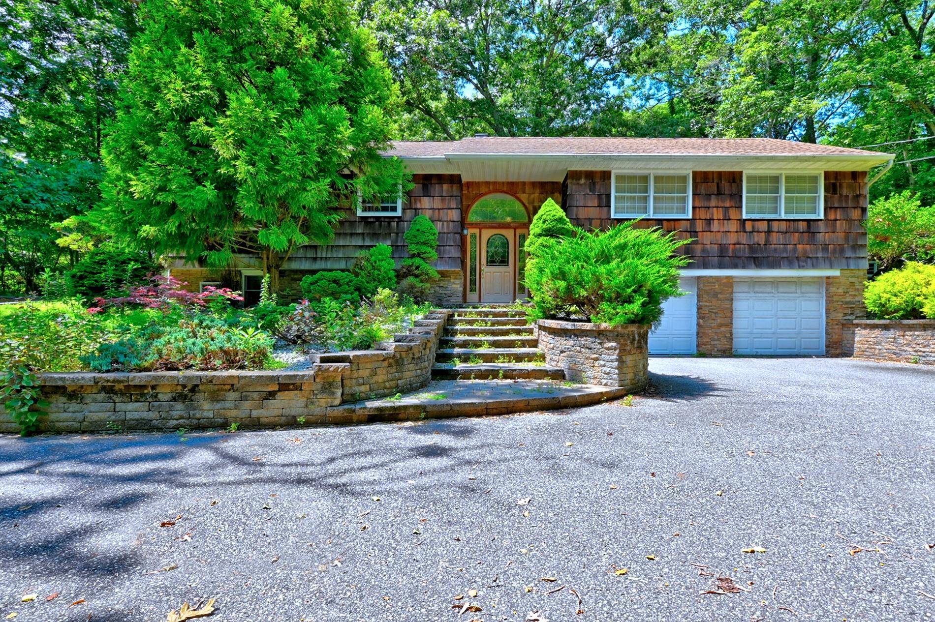 This One of a Kind, 3 Bedroom 3 Baths, secluded Ranch is nestled on 2.