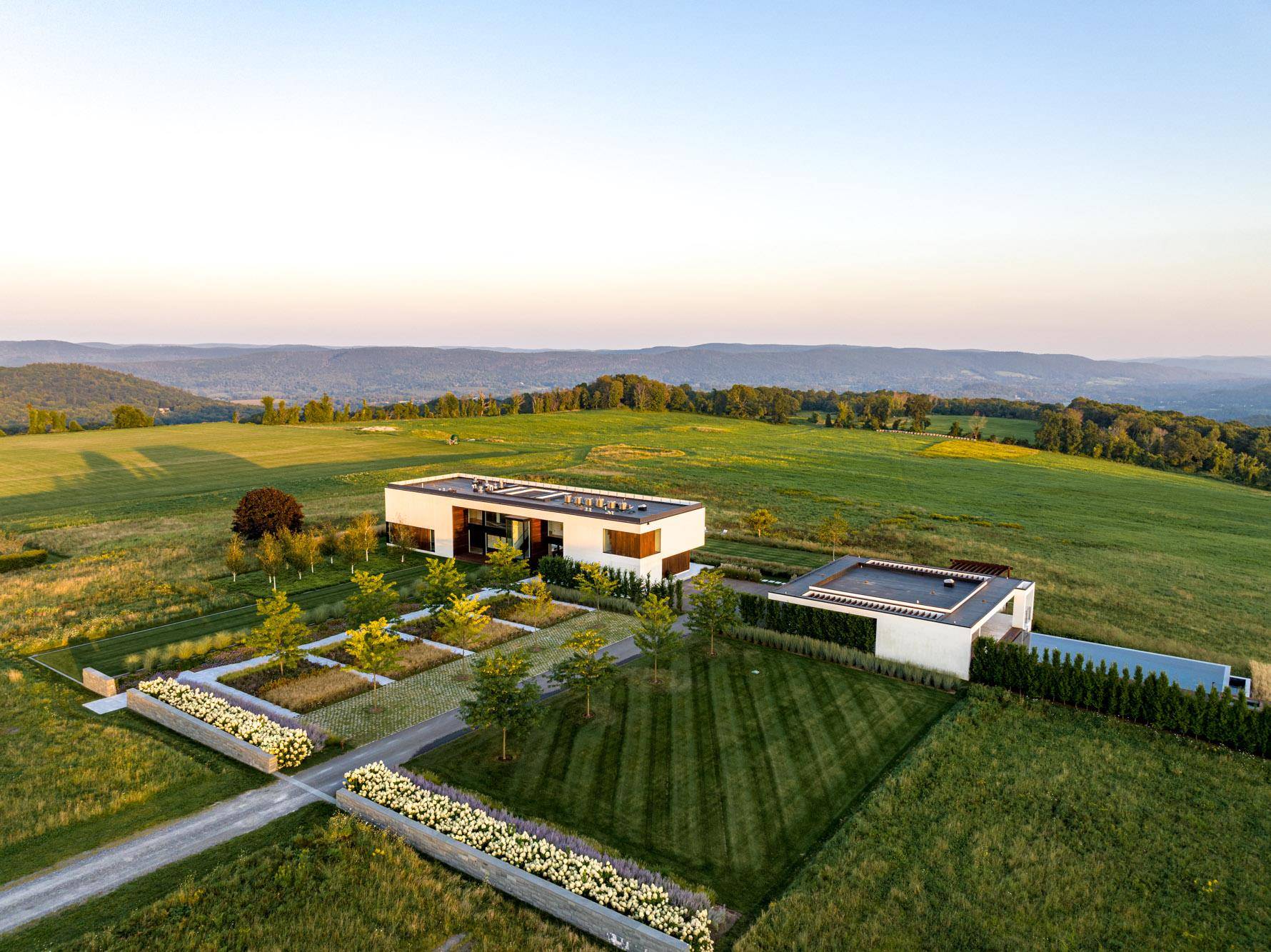 A Private Architectural Masterpiece on 165 Acres Nestled along the border of Amenia and Millbrook, NY, this extraordinary 165 acre estate offers unparalleled privacy and breathtaking panoramic views of the ...