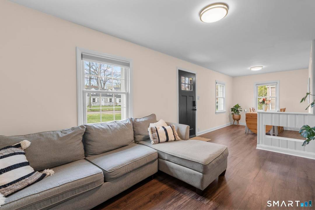 Welcome to this inviting 3 bedroom, 2 bathroom Cape Cod style home nestled in Stamford's popular Turn of River neighborhood !