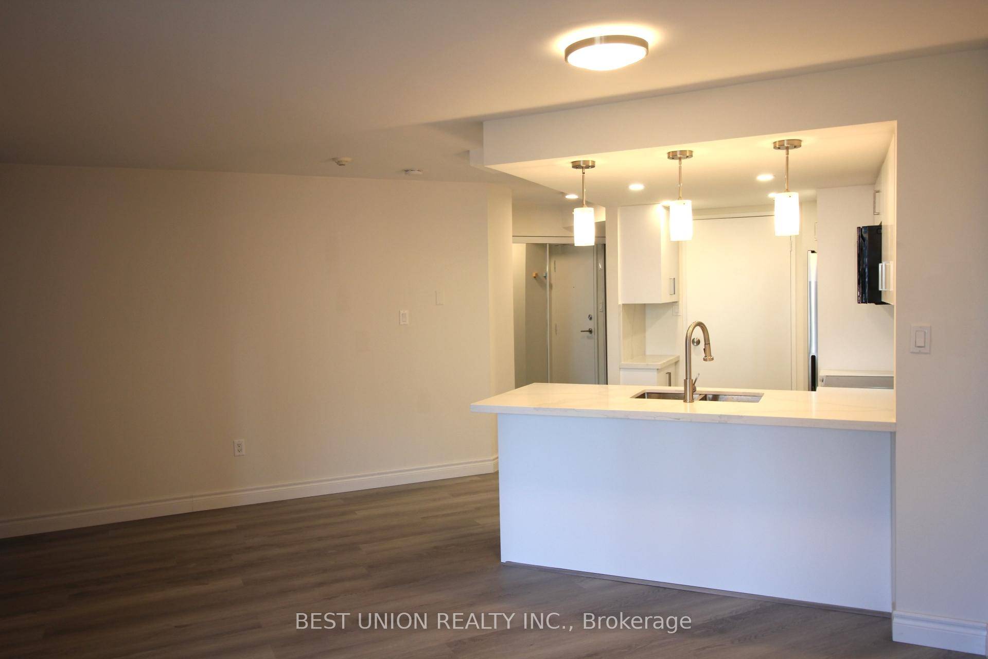 Fully renovated 2 bedroom, 2 bath suite with a modern open concept kitchen, granite counters, stainless steel appliances amp ; breakfast bar.