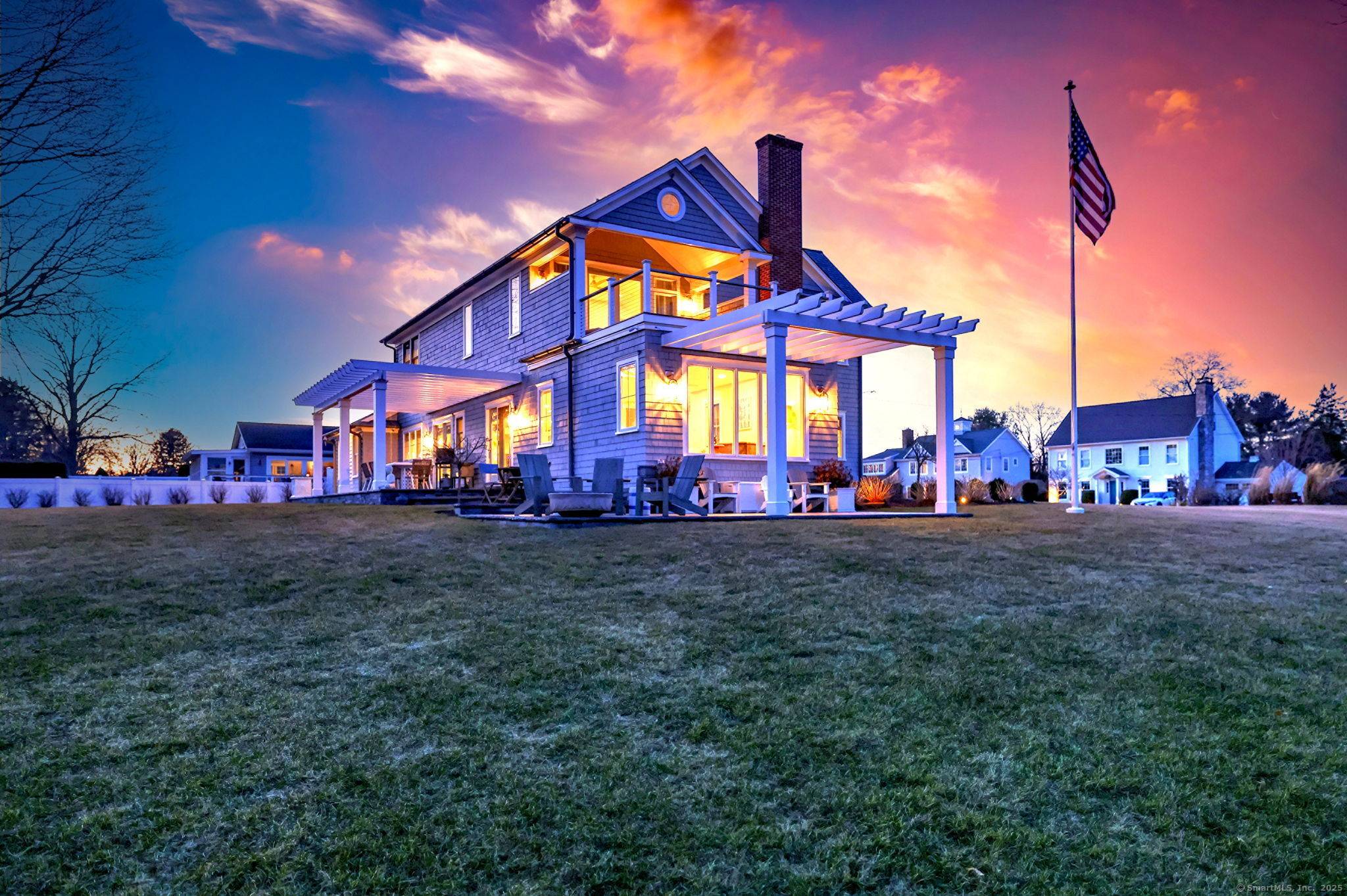 Stunning New England Colonial with Breathtaking Gulf Pond Views.