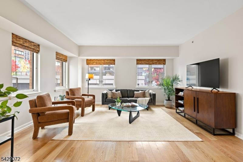 Spacious and bright corner unit overlooking Provost Square.