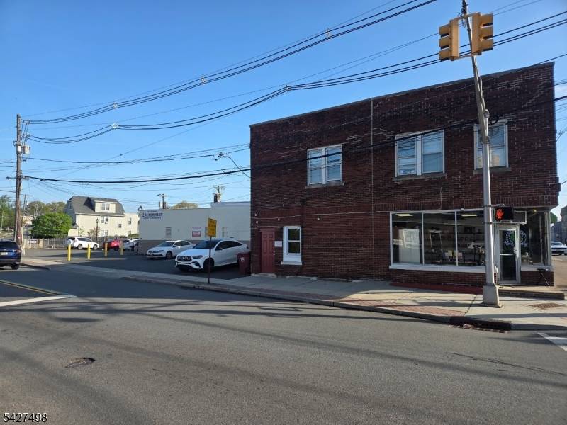Welcome to 108 Franklin Avenue, a prime mixed use investment opportunity ideally located on a prominent corner in the heart of Nutley's thriving business district.