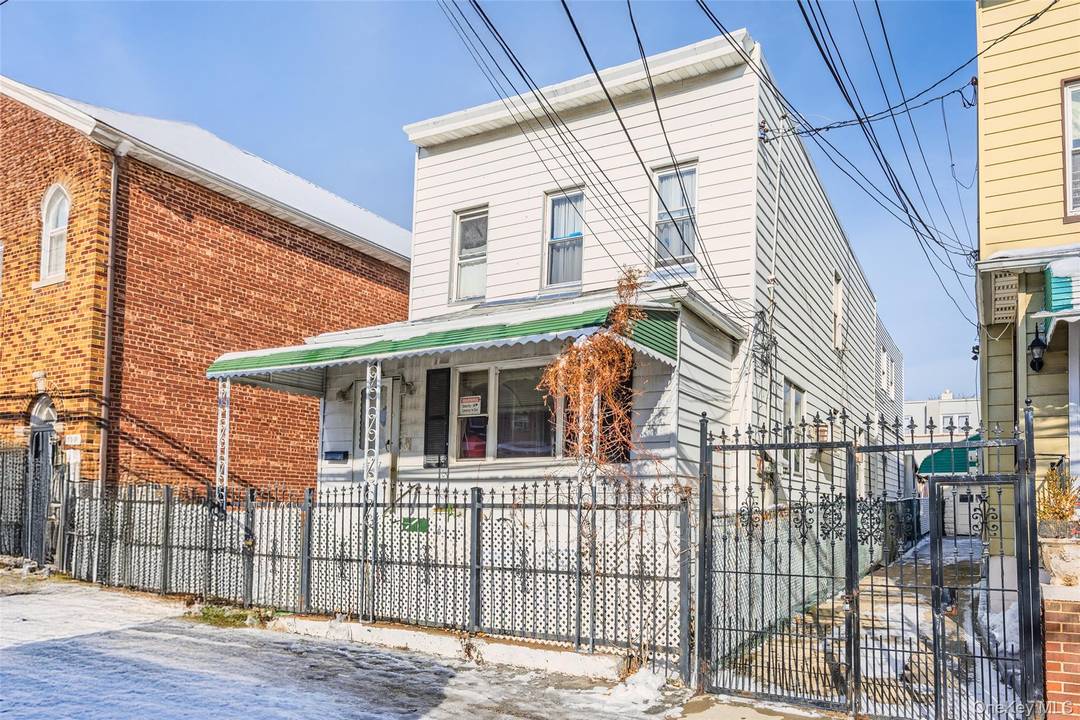 Opportunity awaits in this spacious detached duplex in the heart of Corona offering exceptional potential for investors or end users ready to create their vision.
