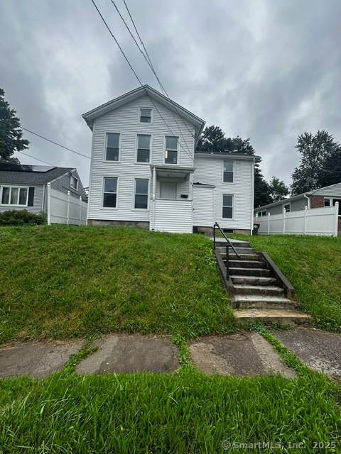 Fully renovated turn key two family home featuring modern updates throughout.