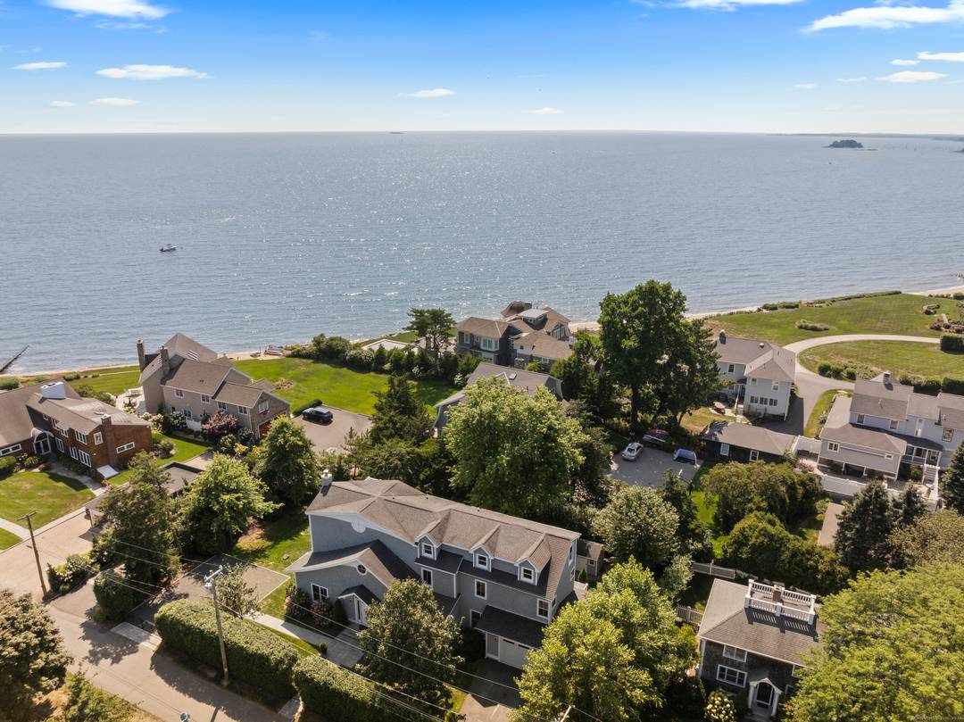 Spacious with amazing waterfront quality views, sited one house from Long Island Sound on a quiet cul de sac.