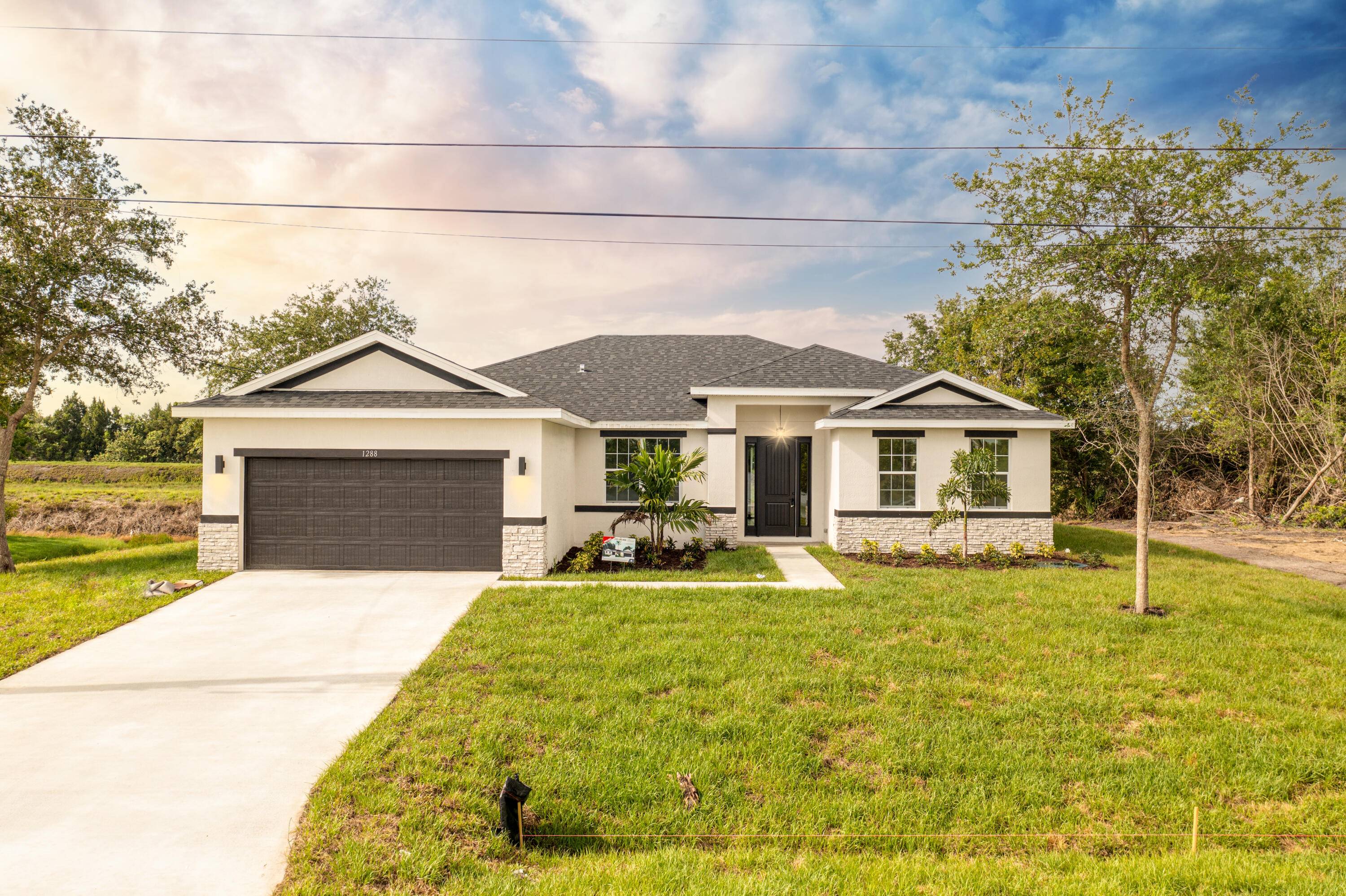 This is a custom 5 bedroom 3 bath Shoreline model completely loaded is in the ''Pocket'' and area basically in Tradition with NO HOA AND NO CDD.