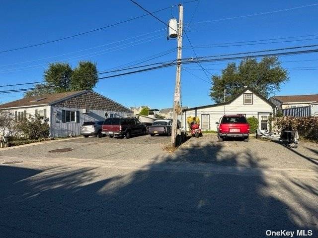 Opportunity Awaits ! 3 Property Sale with 3 Houses, Garage, Waterfront, 15 Boat Slips