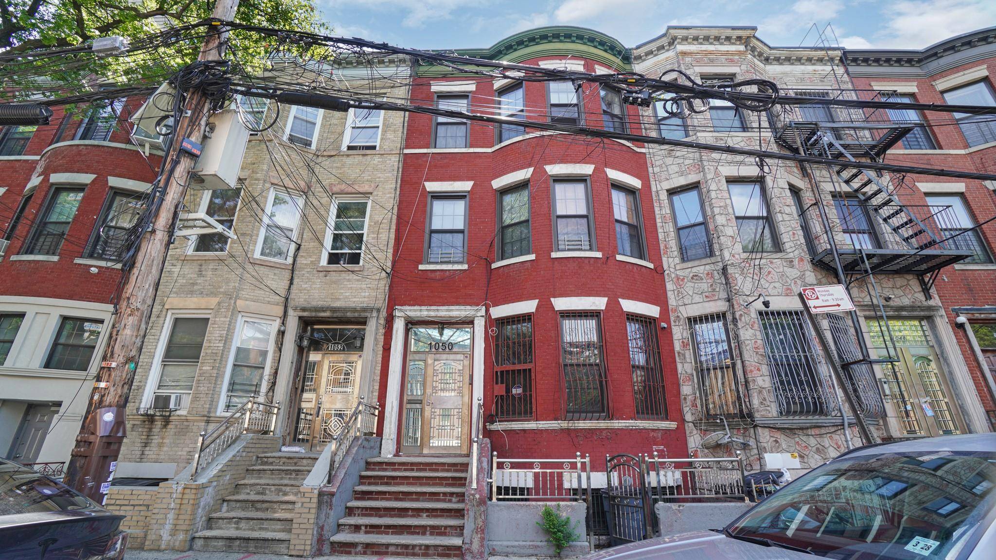 Historic 3 Family Brick Building plus high ceiling basement in Concourse Village, Bronx.