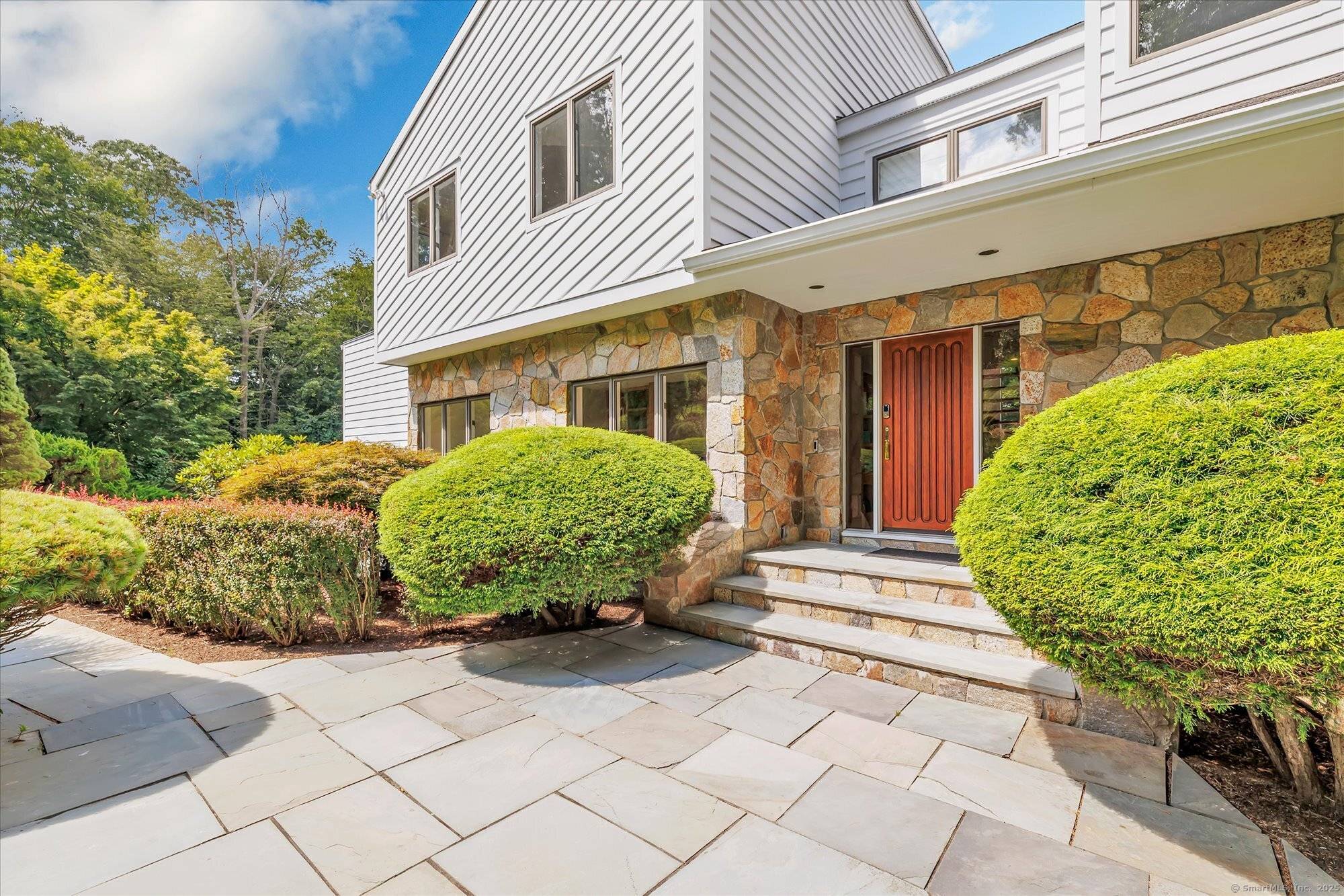 Tucked away on a private cul de sac just minutes from downtown Westport, beaches, and award winning restaurants, this 6 bedroom, 8 bath residence combines modern architectural design with serene ...