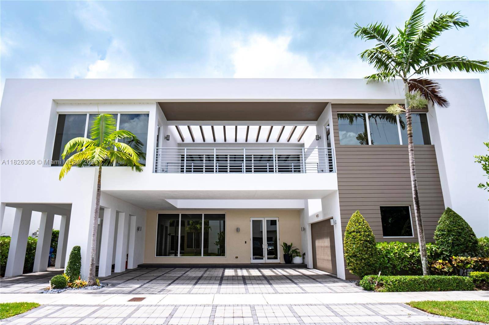 Stunning and impeccable home at the prestigious Modern Doral 75.