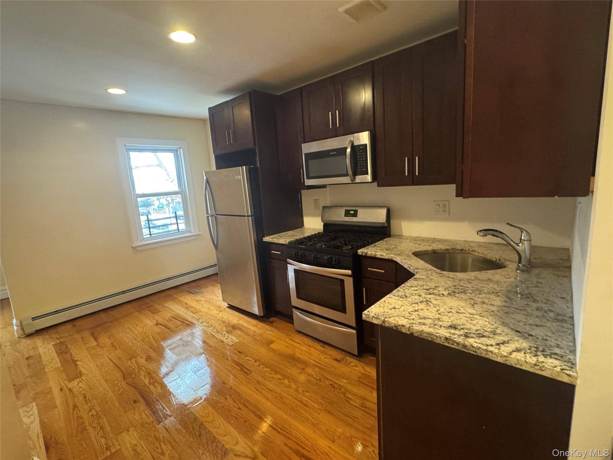 Step into this beautifully renovated 3 bedroom, 1 bathroom duplex apartment where modern design meets everyday comfort.