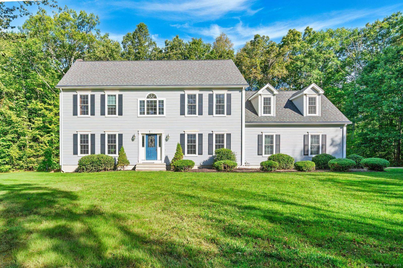 Set on a quiet cul de sac and surrounded by over two acres of serene natural beauty, this 2, 996 sq.