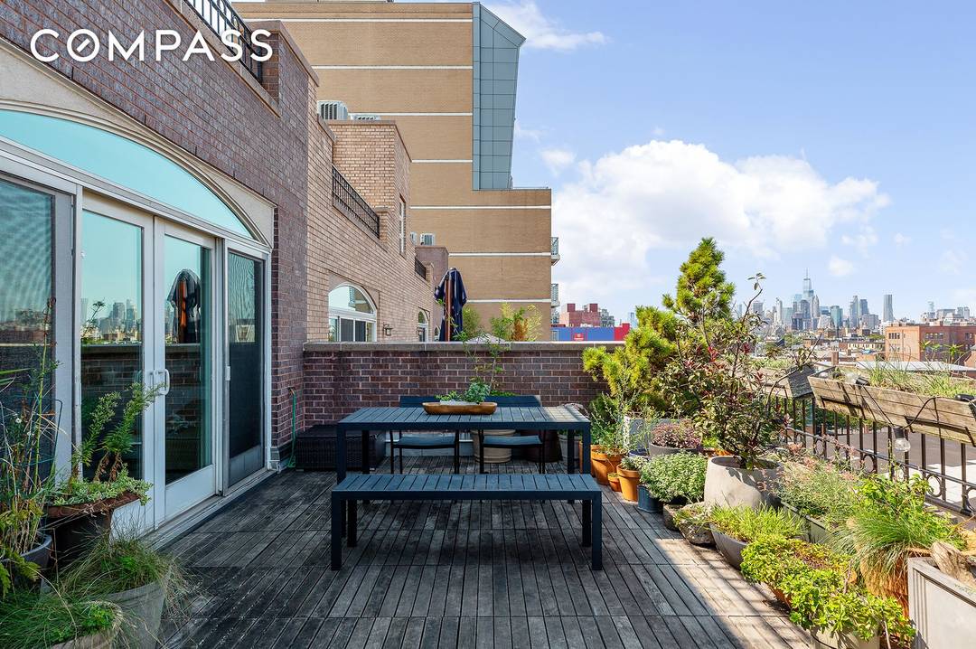A two bedroom, one bathroom Park Slope condo with two private outdoor spaces including a sprawling terrace off the living room with jaw dropping city views and a balcony off ...