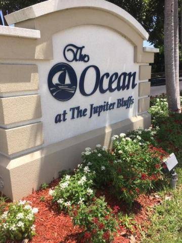 Enjoy stunning ocean and lake views from this beautifully updated top floor end unit.