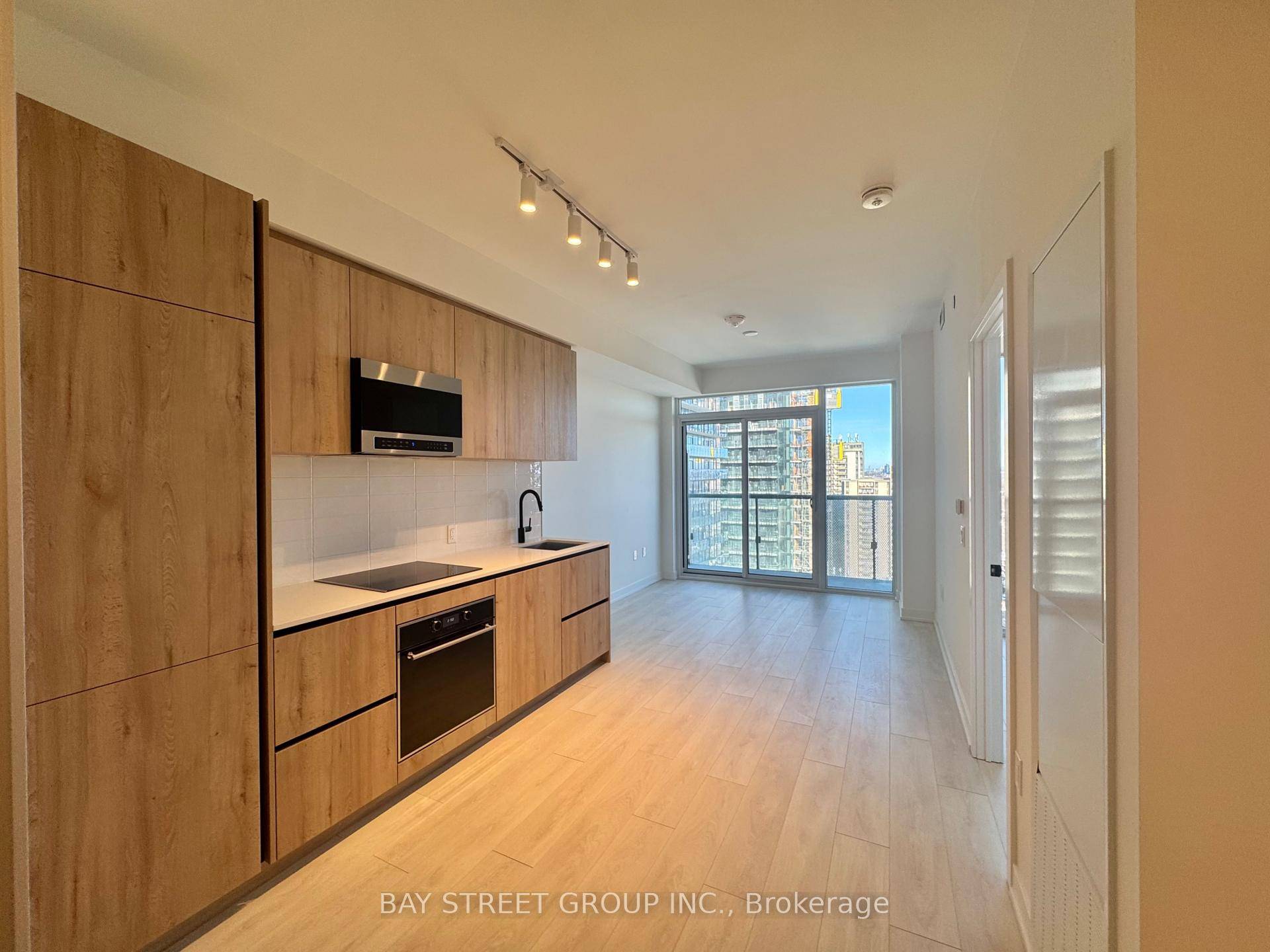 Brand New Line 5 Condos. NORTH facing, 1 bedroom den suite with large balcony and floor to ceiling windows.