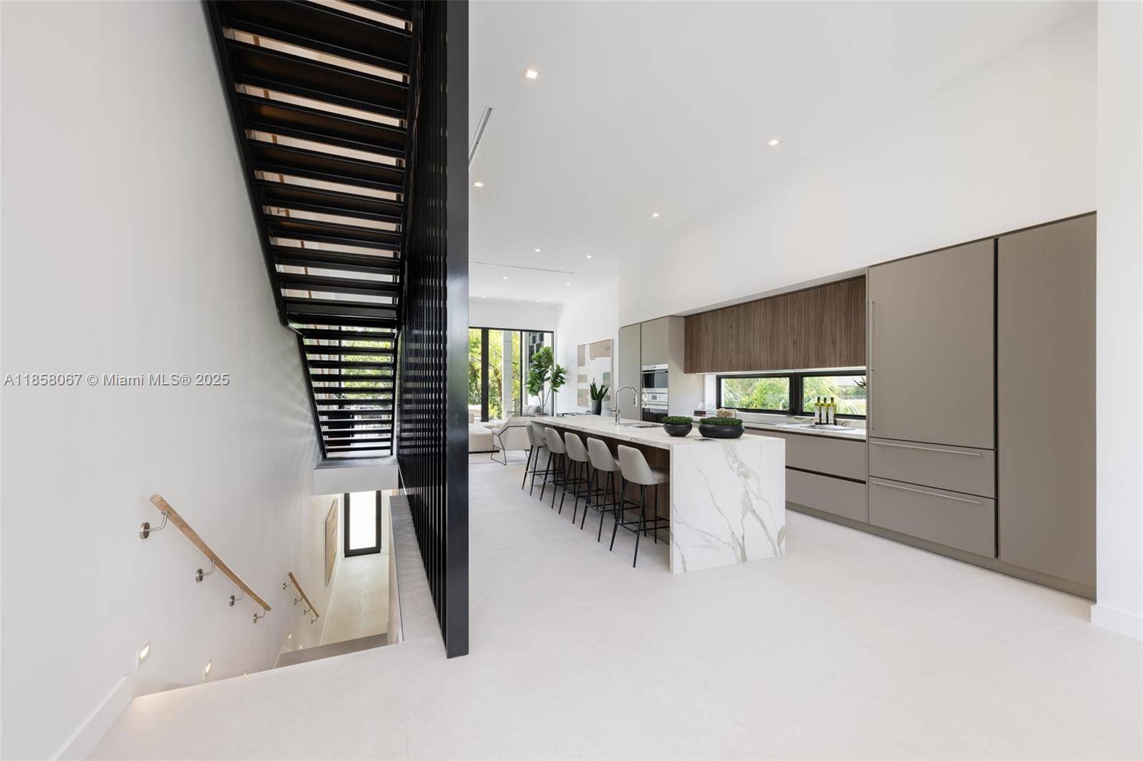 Award winning contemporary residence in The Roads Townhomes featuring a distinctive formed concrete fac ade.