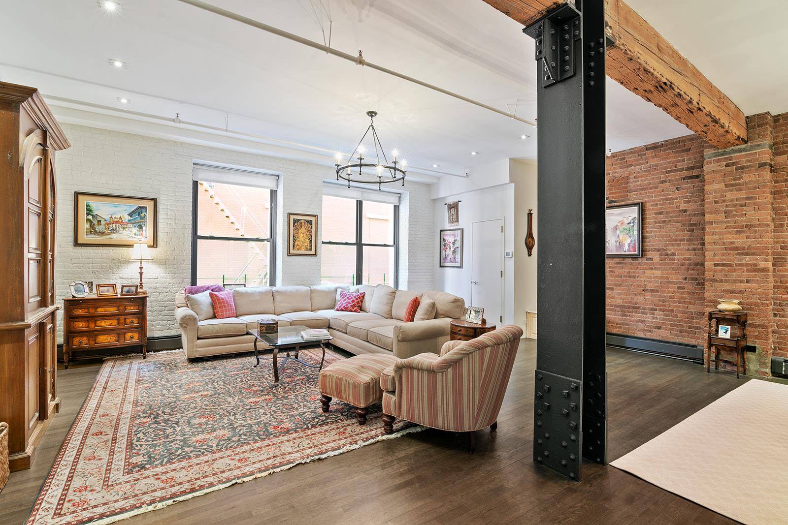 Rarely available 1550 SF two bedroom, two full bath authentic loft features a wonderful layout and an abundance of Prewar charm, character, and classic architectural details !