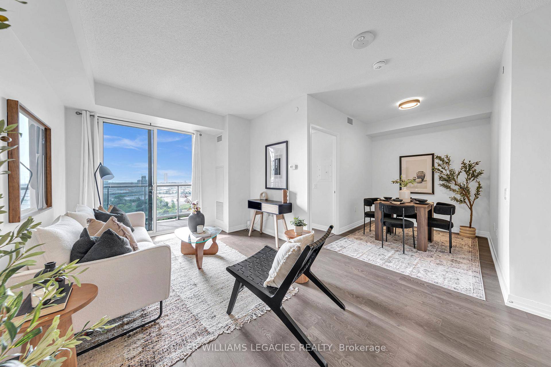 This bright and modern 1 1 bedroom, 1 bathroom unit offers over 630 sqft with an open concept layout flooded with natural light from large windows.