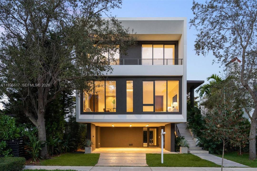Experience elevated luxury in this exceptional Coconut Grove residence, where open concept interiors, bespoke built ins, and refined finishes define effortless sophistication.