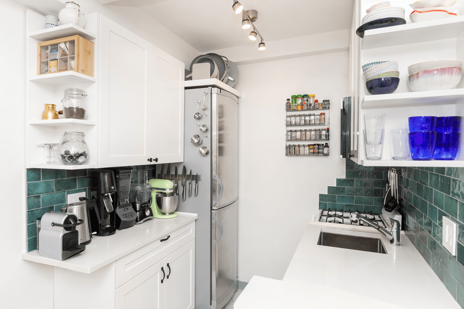 Quiet one bedroom home on first floor of ca 1928 Art Deco Coop has been thoughtfully renovated with careful attention to every detail, insuring gracious living.