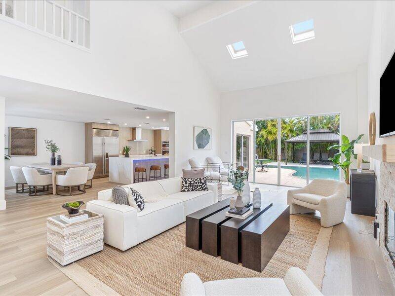 This exquisite home is located in the prestigious Breakers West Country Club and has been fully remodeled.