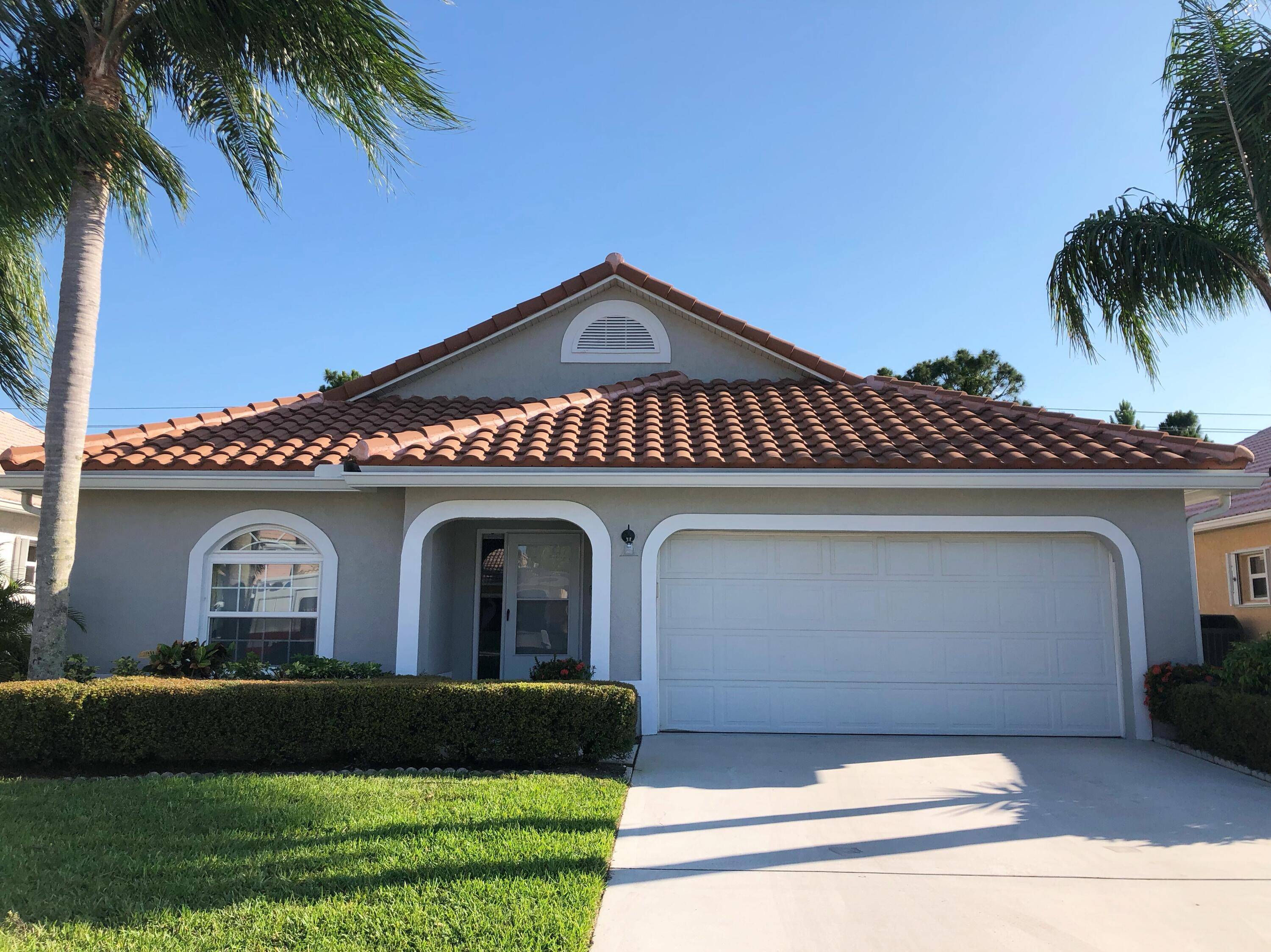 This lovely 3 bedroom 2 bath home is located in a gated community in the sought after town of Stuart.
