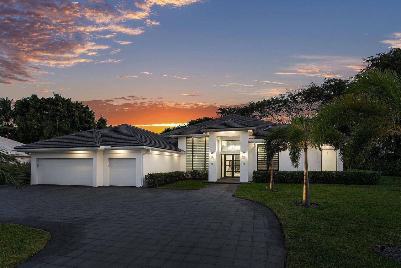 Step into this completely renovated, contemporary home nestled on nearly an acre of private property at the end of a quiet cul de sac.