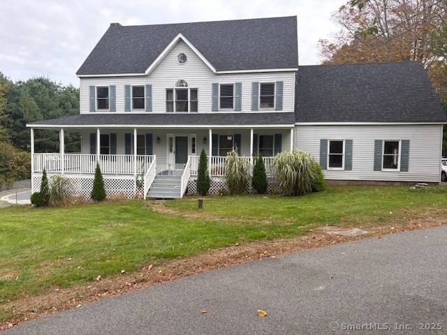 Nestled on a peaceful country road, this spacious Colonial offers 4 bedrooms and 2.