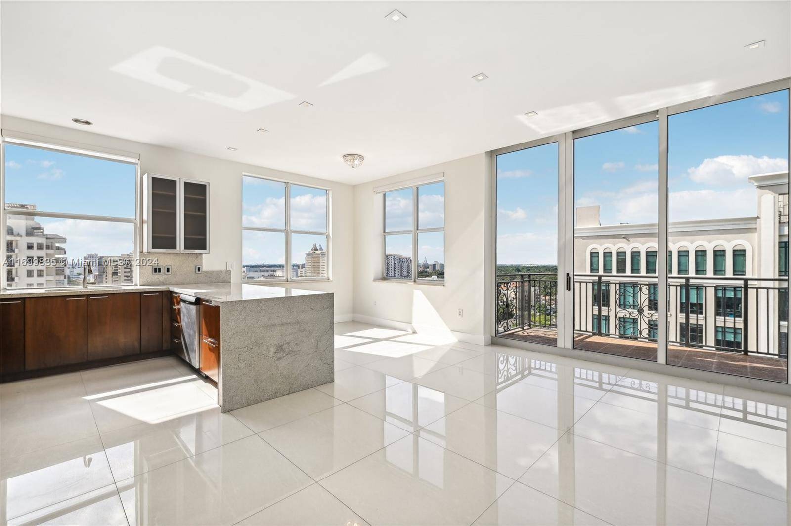 Spectacular 3 2 corner unit on PONCE DE LEON BLVD, steps from Downtown Gables.