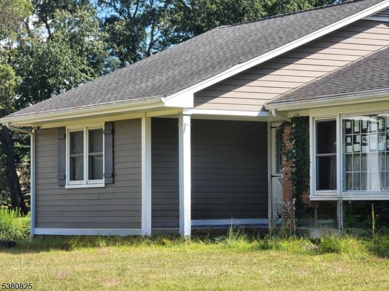 Custom Built Ranch, Set back from road for privacy, Wood Burning Fireplace, 2 Car Oversized Garage, Replacement Windows, Newer Basement Refrigerator, Washer Dryer, Newer Roof Siding, Public Water, New Full ...