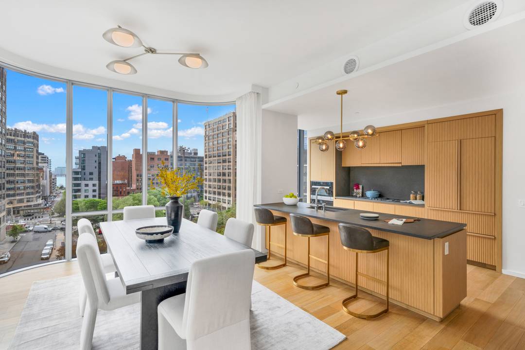 Come bask in the light of this spacious Southwest corner two bedroom, two and a half bath home.