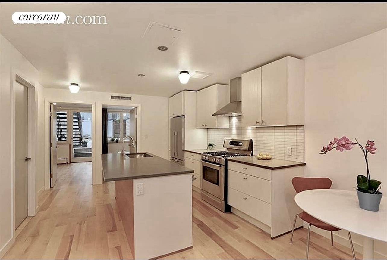 Rare find. Fort Greene beautifully custom renovated 2 bedroom, 1 bath townhouse garden apartment, located on a tree lined residential block of historic brick and brownstone townhouses.