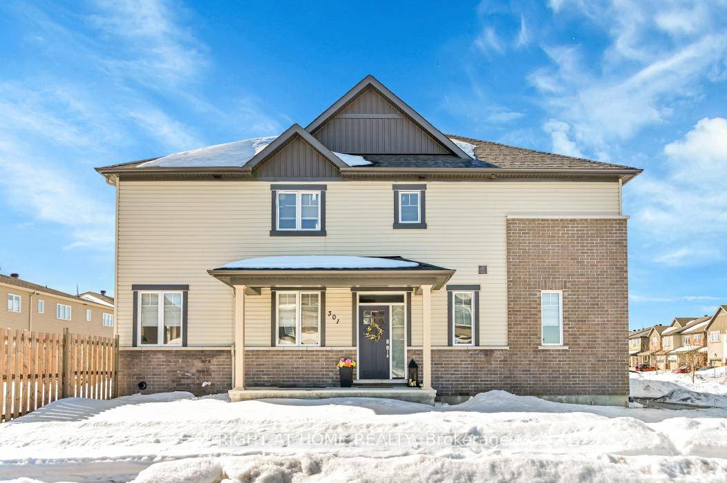 Welcome to 301 Guppy Grove, an amazing end unit, corner lot townhome.