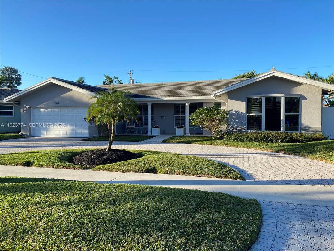 Beautifully Updated 3BR 3BA Pool Home with Smart Features and Impact Windows.