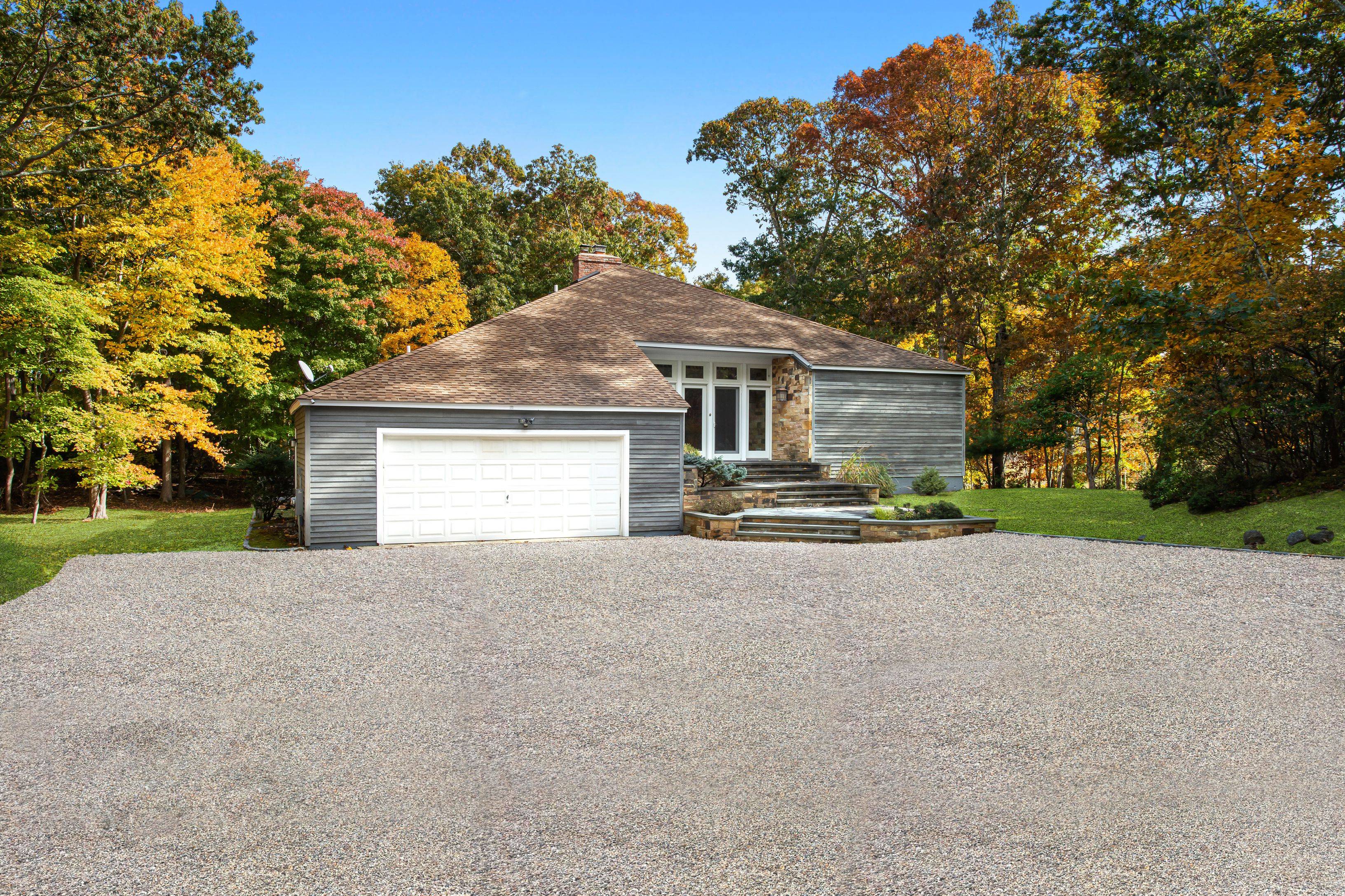 Hamptons contemporary with heated gunite pool
