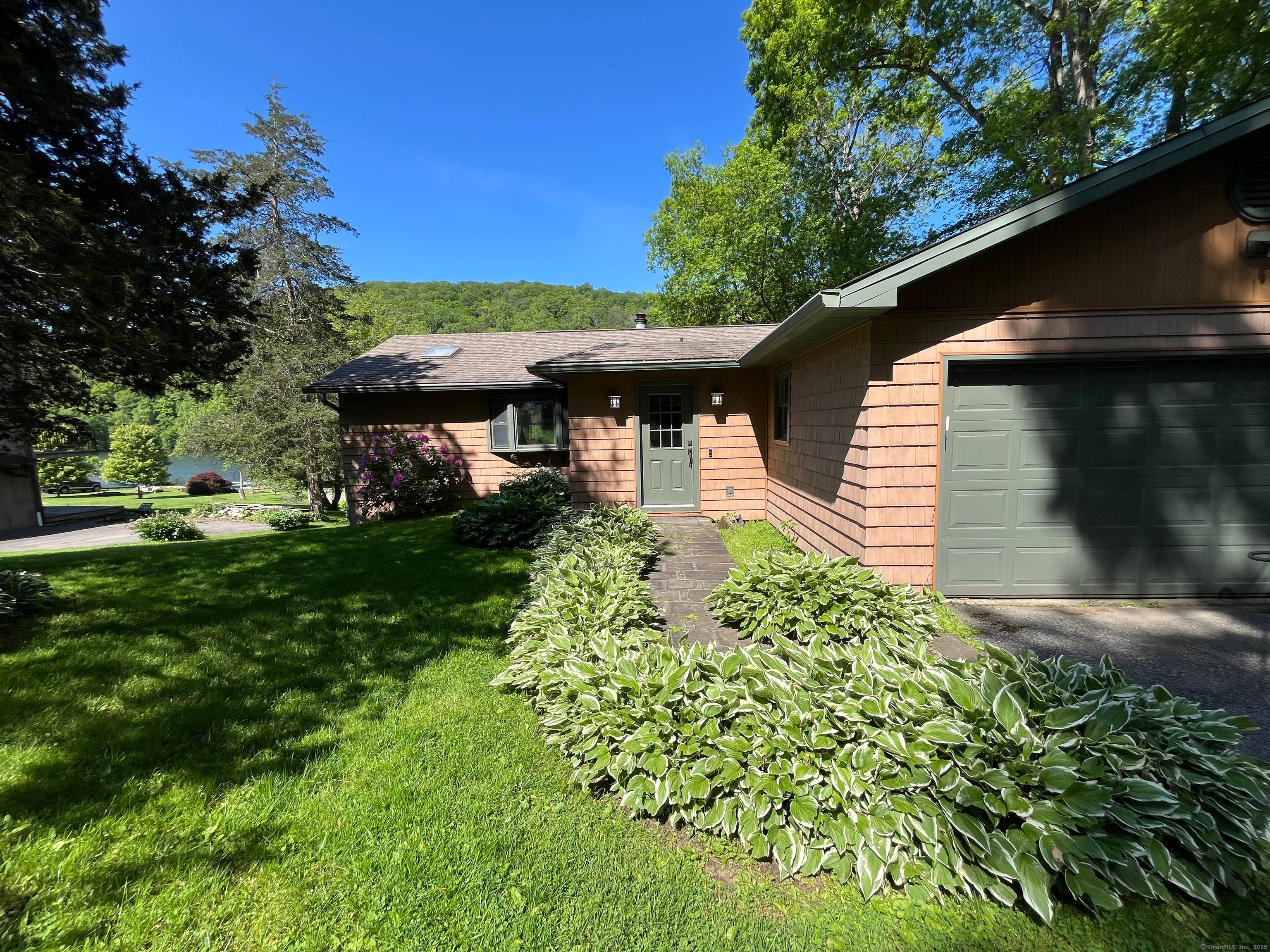 Pull into the end of the cul de sac and enjoy your just under half acre of privacy with 100' DIRECT LEVEL WATERFRONT on Squantz Pond in the private lake ...
