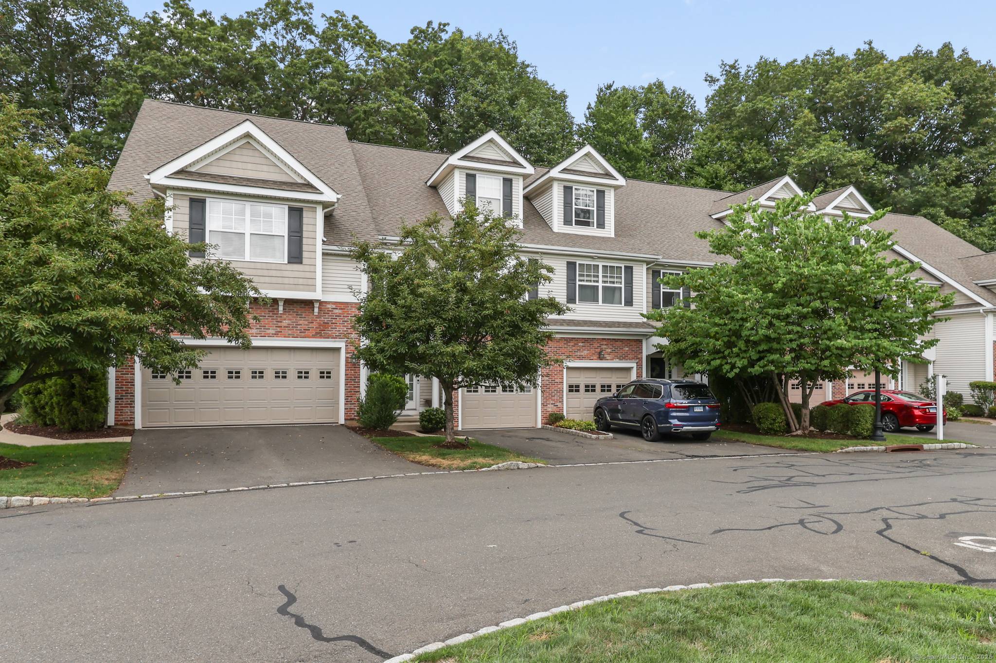 This stunning home at 16 Schoolhouse Dr in West Hartford showcases extensive upgrades and a thoughtfully designed layout.