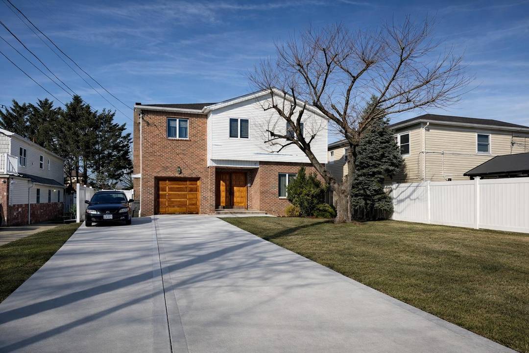 Large Detached Two Family Home on Oversized 52x144 Lot Endless Possibilities !