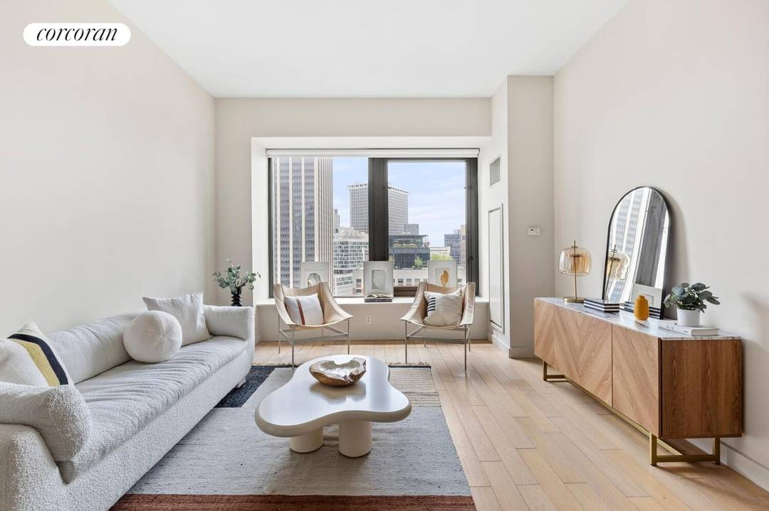 This modernized studio loft at 75 Wall Street features unobstructed southern and southeastern exposures with abundant natural light throughout the day.