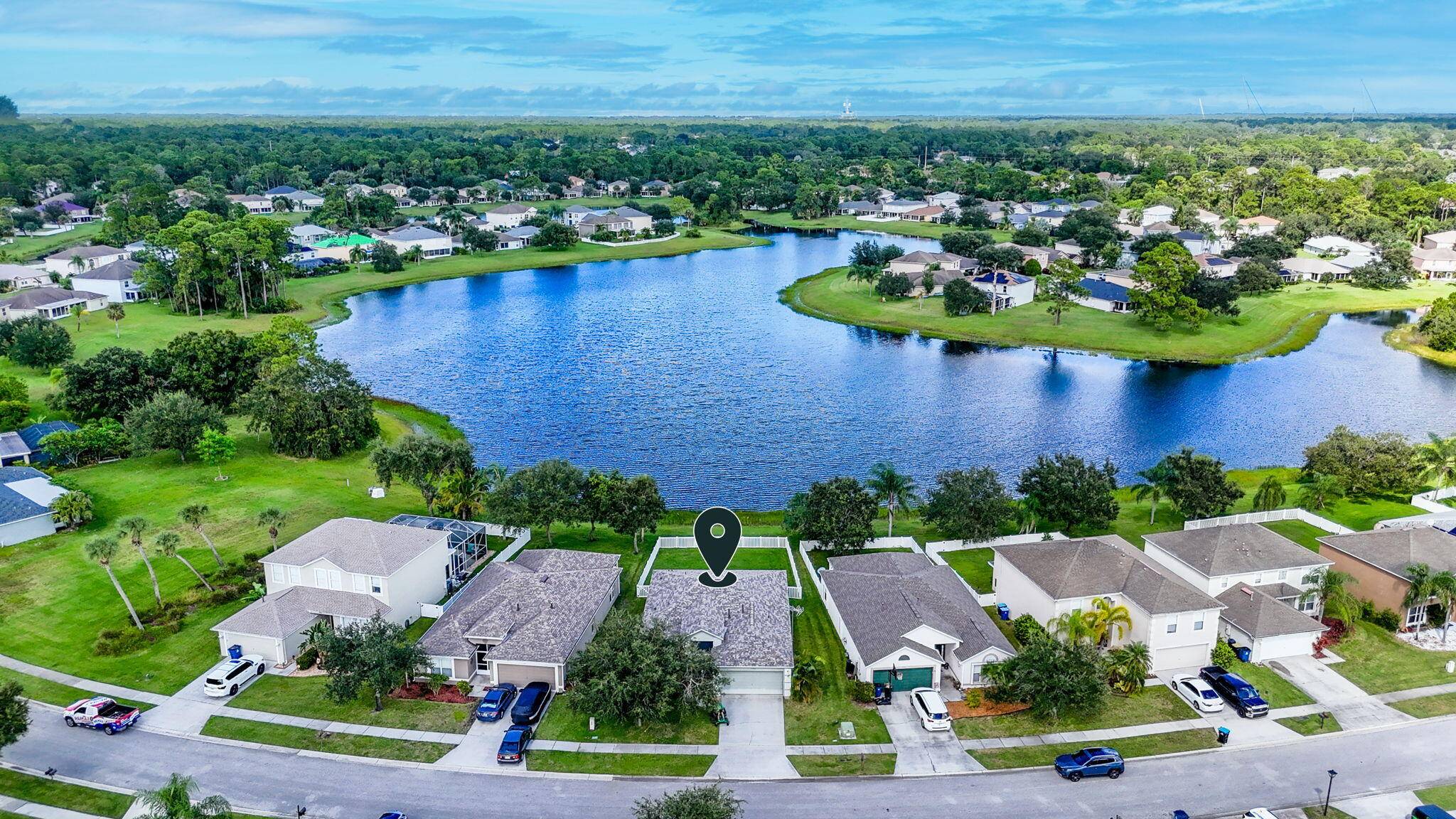 Welcome to this beautifully, Low HOA, updated lakefront home in the gated community of Bridgewater at Bayside Lakes !