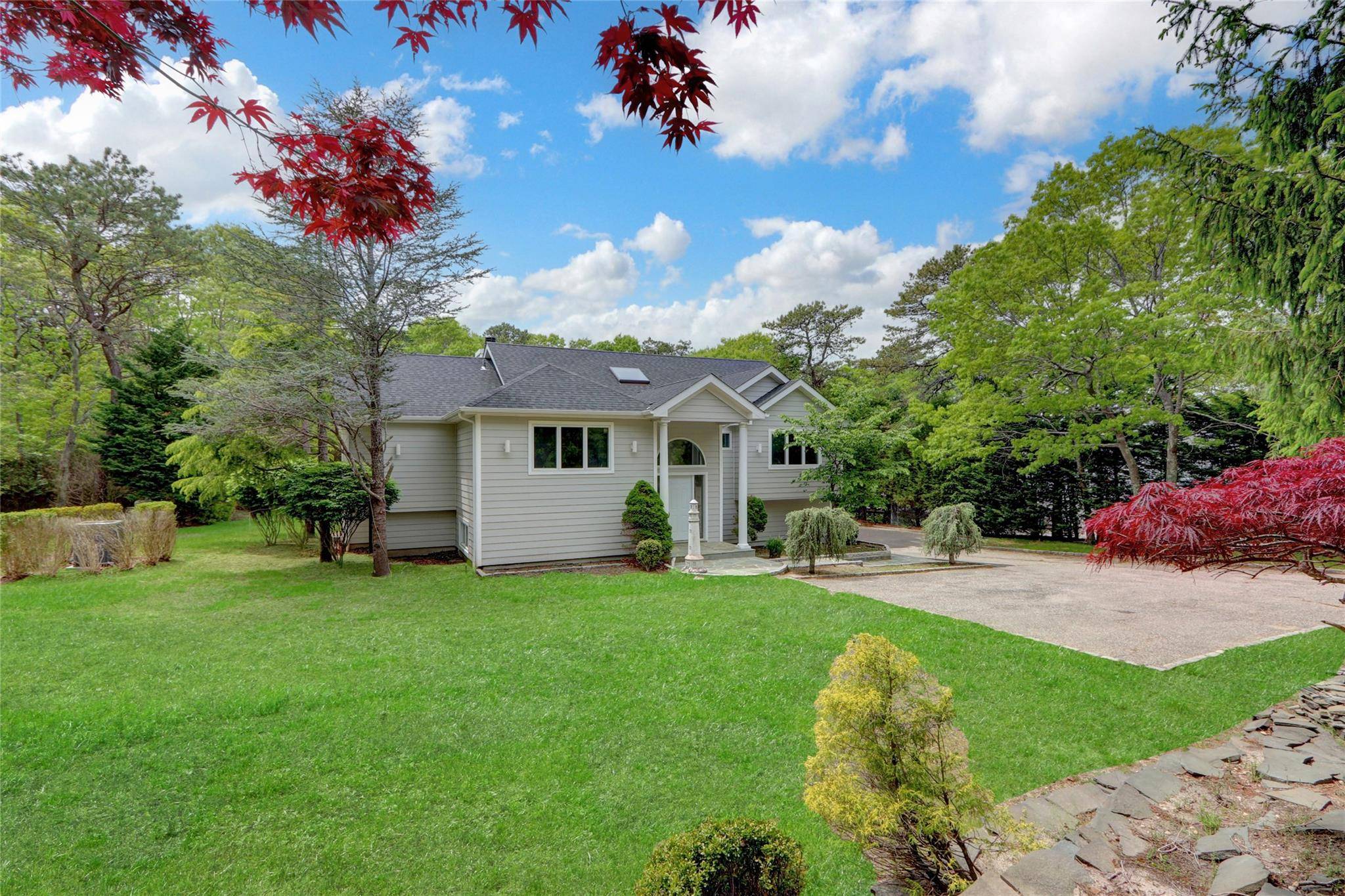 Welcome to this fully renovated, privately gated home located in the highly sought after Red Creek Ridge community, just minutes from the beach.